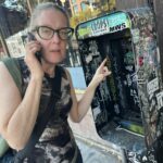 Kim Hume at an old phone booth