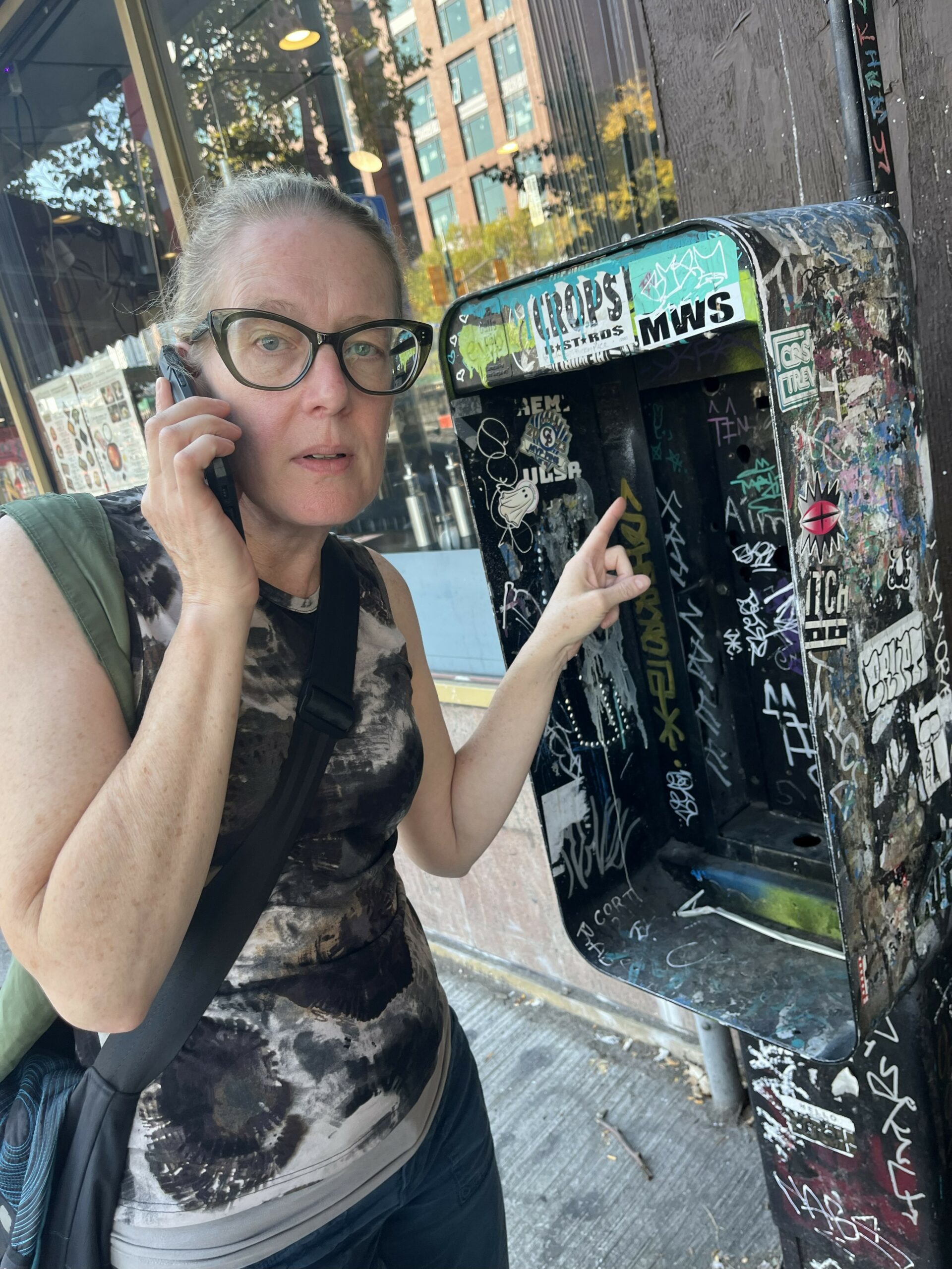 Kim Hume at an old phone booth